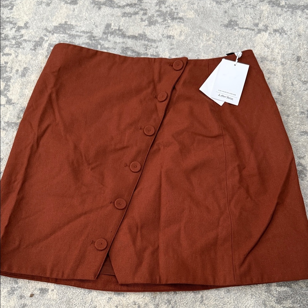 Brown button down asymmetrical mini skirt